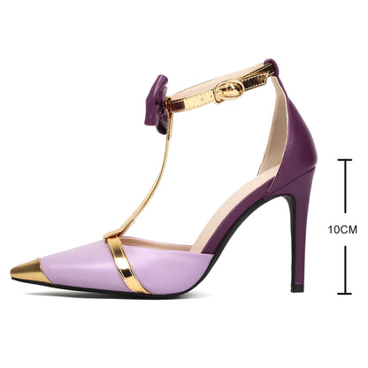 Gisele Bow-Strap Stilettos in lavender vegan leather, featuring a pointy-toe design, gold accents, and a 10cm high heel.